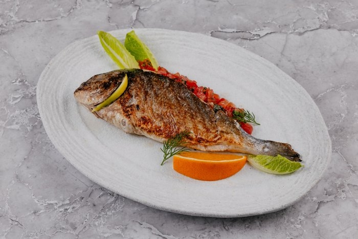 Запеченая дорадо за 100гр.